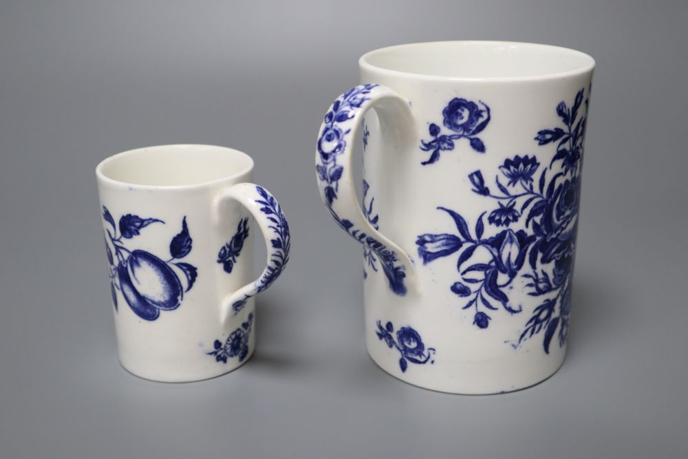 A Worcester style pine cone pattern bone china mug and a similar fruit decorated small mug, late 19th century, 12cm and 8cm